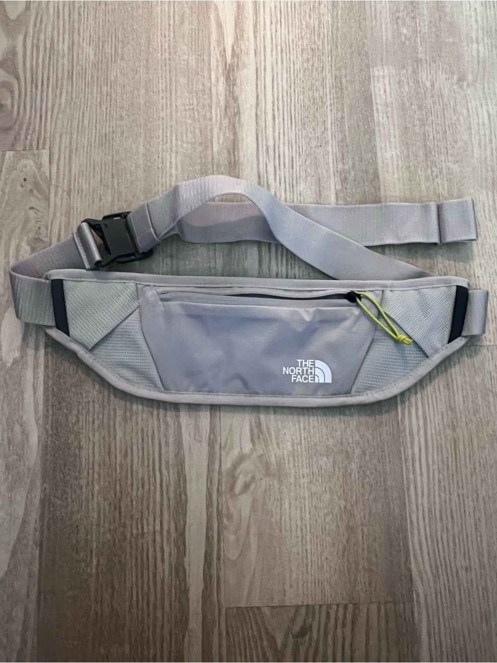 The North Face Light Gray Waist Pack with Neon Green Pull